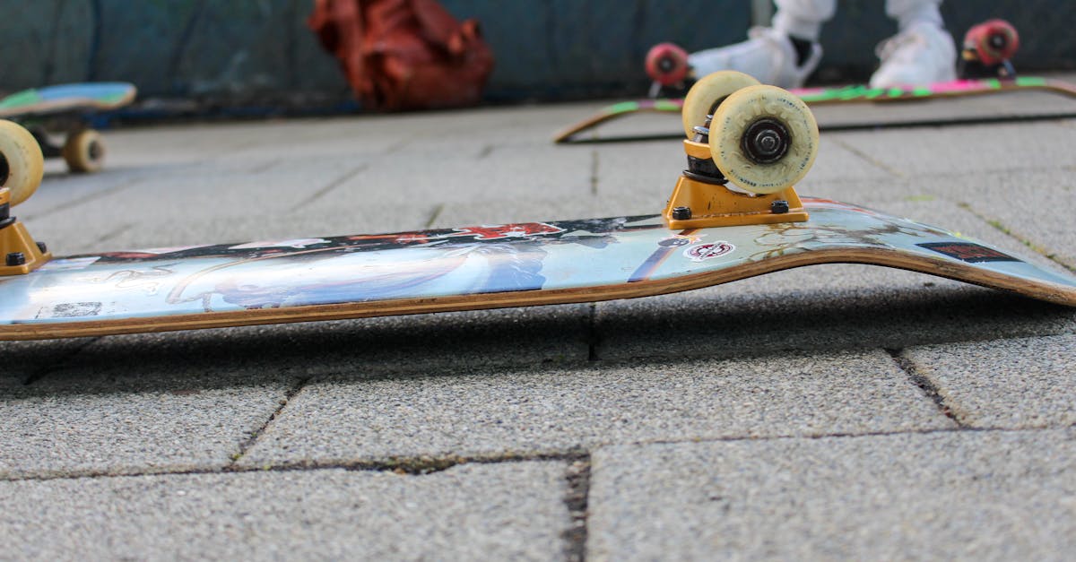 Close-up of an upside down skateboard on a tile pavement in Reading, UK.
