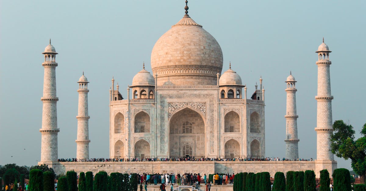 A stunning shot of the Taj Mahal in Agra, showcasing its iconic architecture and serene surroundings.